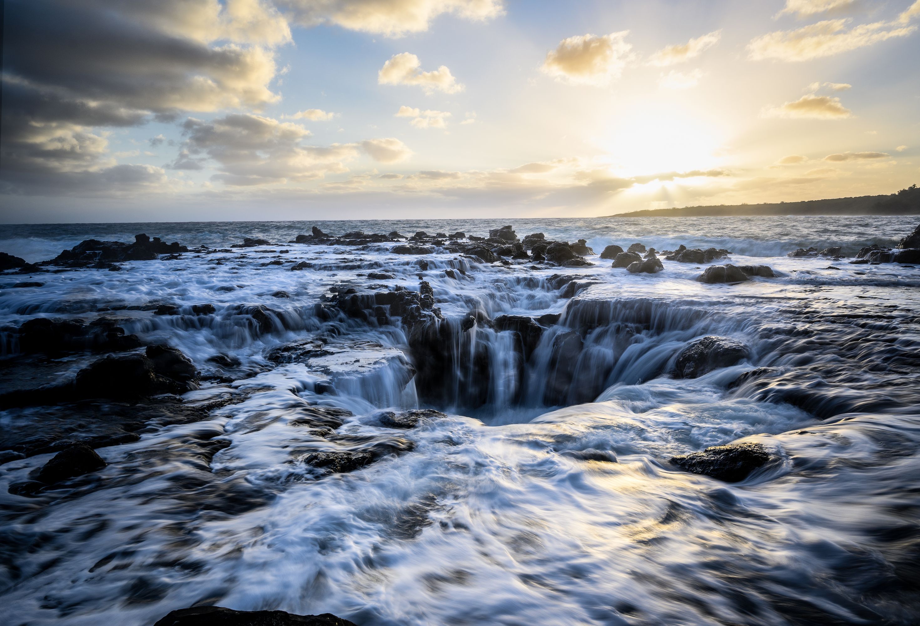 Lava rock tide pool coastline near Princeville, Kauai